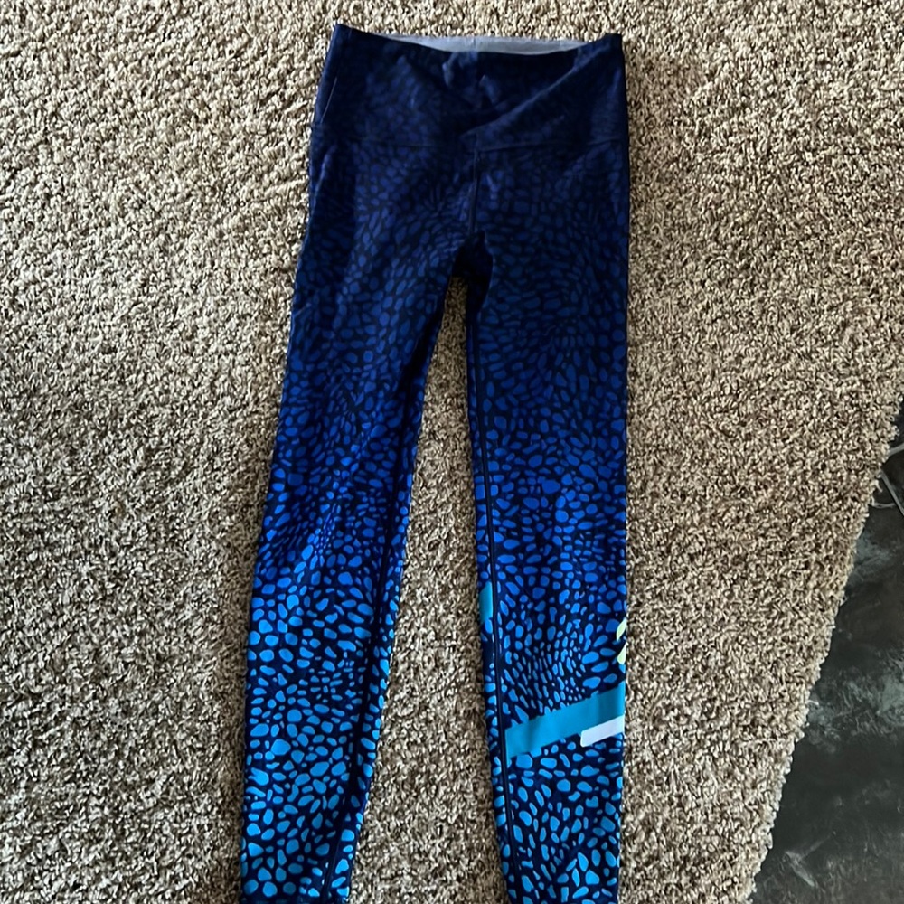 WITH BRAND leggings size unknown. See description for measurements.